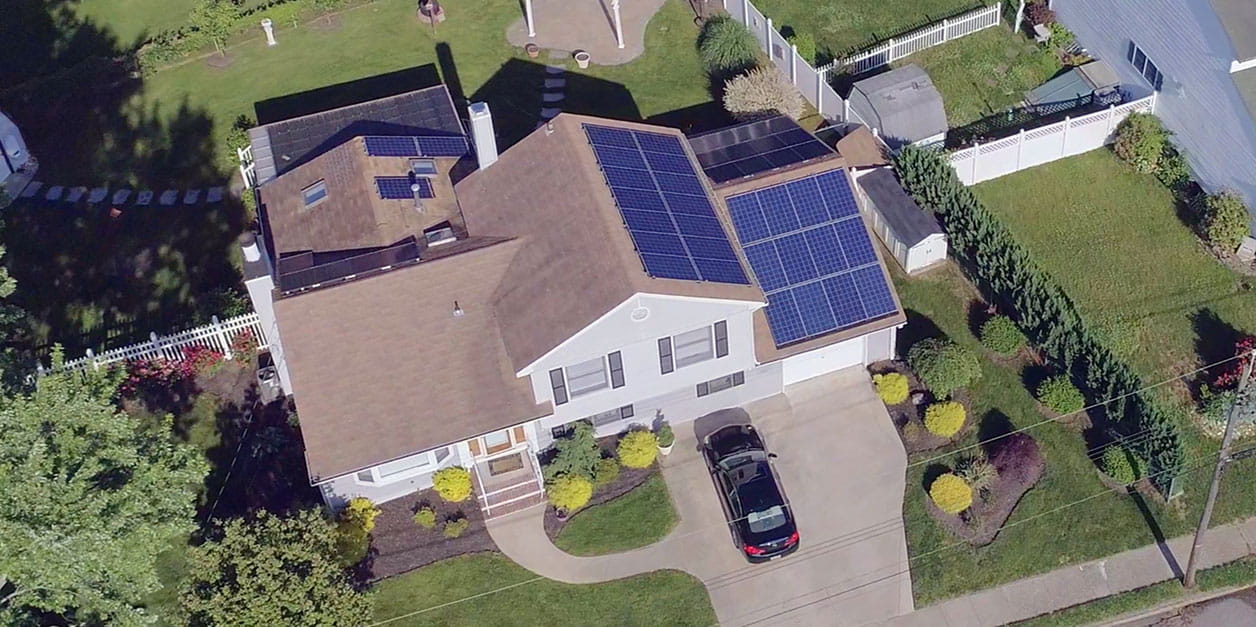 ariel view of house with solar panels