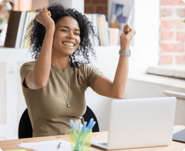 a woman with her hands up in the air