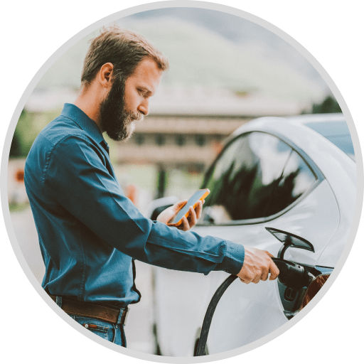 New customer charging his EV before shopping at a local business