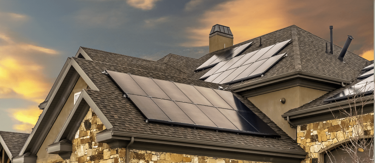 Home at Dusk with solar panels installed on roof